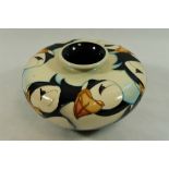 A modern Moorcroft puffin vase, of squat form, signed and dated 2009, 43cm high,