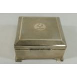 A George V square silver cigarette box, Chester 1921,