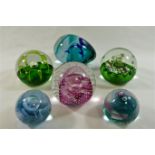 A collection of 45 paperweights including a limited edition Caithness Glass paperweight by Peter