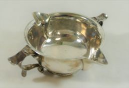 An Arts and Crafts silver two handled an