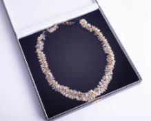 A fancy 14ct yellow gold and moon stone set necklace.