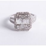An 18ct white gold and diamond halo ring, approx. 2.25ct, size N.