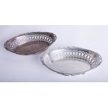A pair of Geo V silver dishes of pierced design, 21 x 14cm, maker 'F & S', approx. 8.63oz.