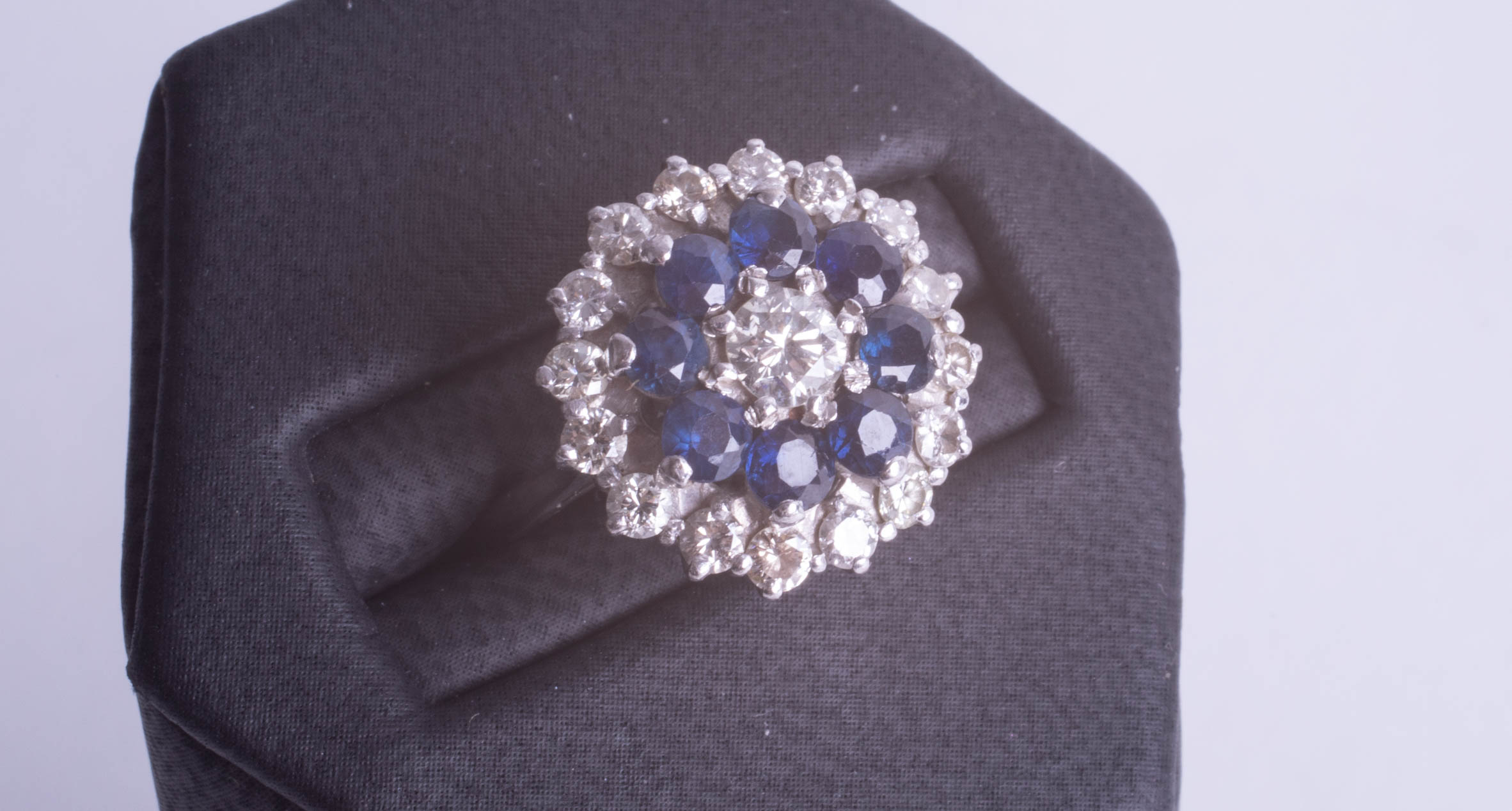 An 18ct sapphire and diamond cluster ring, size L. - Image 2 of 2