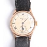 A 1950's gents J.W. Benson 9ct wristwatch, the dial with chapter ring and sub seconds with