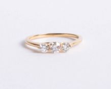 An 18ct gold and diamond trilogy ring approx. 0.50ct, size M.