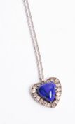 A pendant of heart design set with blue hardstone and diamonds, Provenance, from the family of