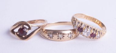 An antique 18ct ruby and diamond ring, and two other gold and gemstone rings (3).