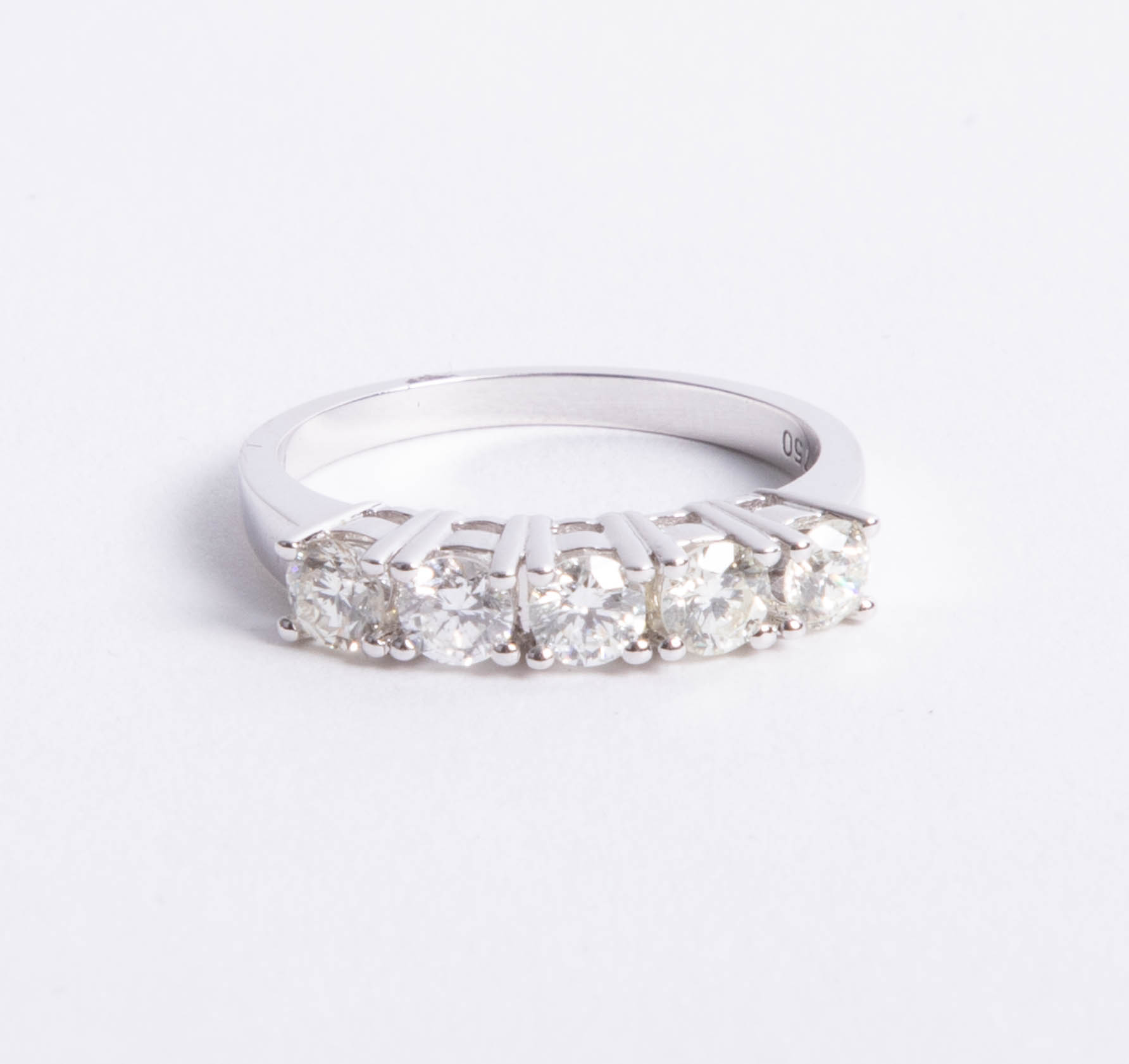 An 18ct white gold and diamond five stone ring approx. 1.00ct, size O.