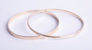 Two gold bangles unmarked, approx 26.50g