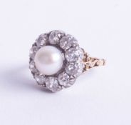 An 18ct Victorian diamond and Southsea pearl ring, measuring approx. 8.2mm in diameter, set as a