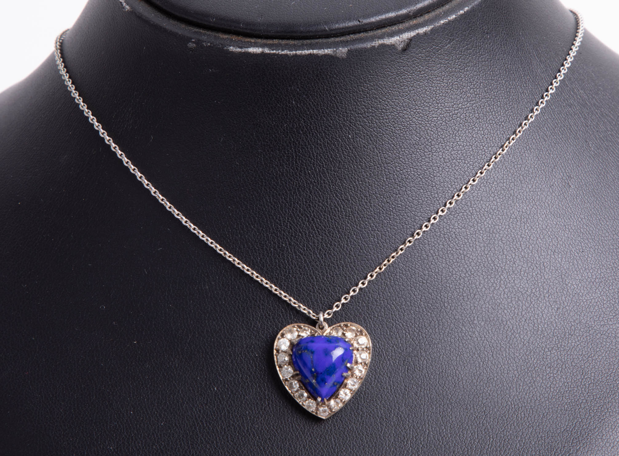 A pendant of heart design set with blue hardstone and diamonds, Provenance, from the family of - Image 2 of 2