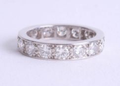 A diamond full band eternity ring probably platinum, size I.
