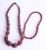 A red amber bead necklace, 88.8g.
