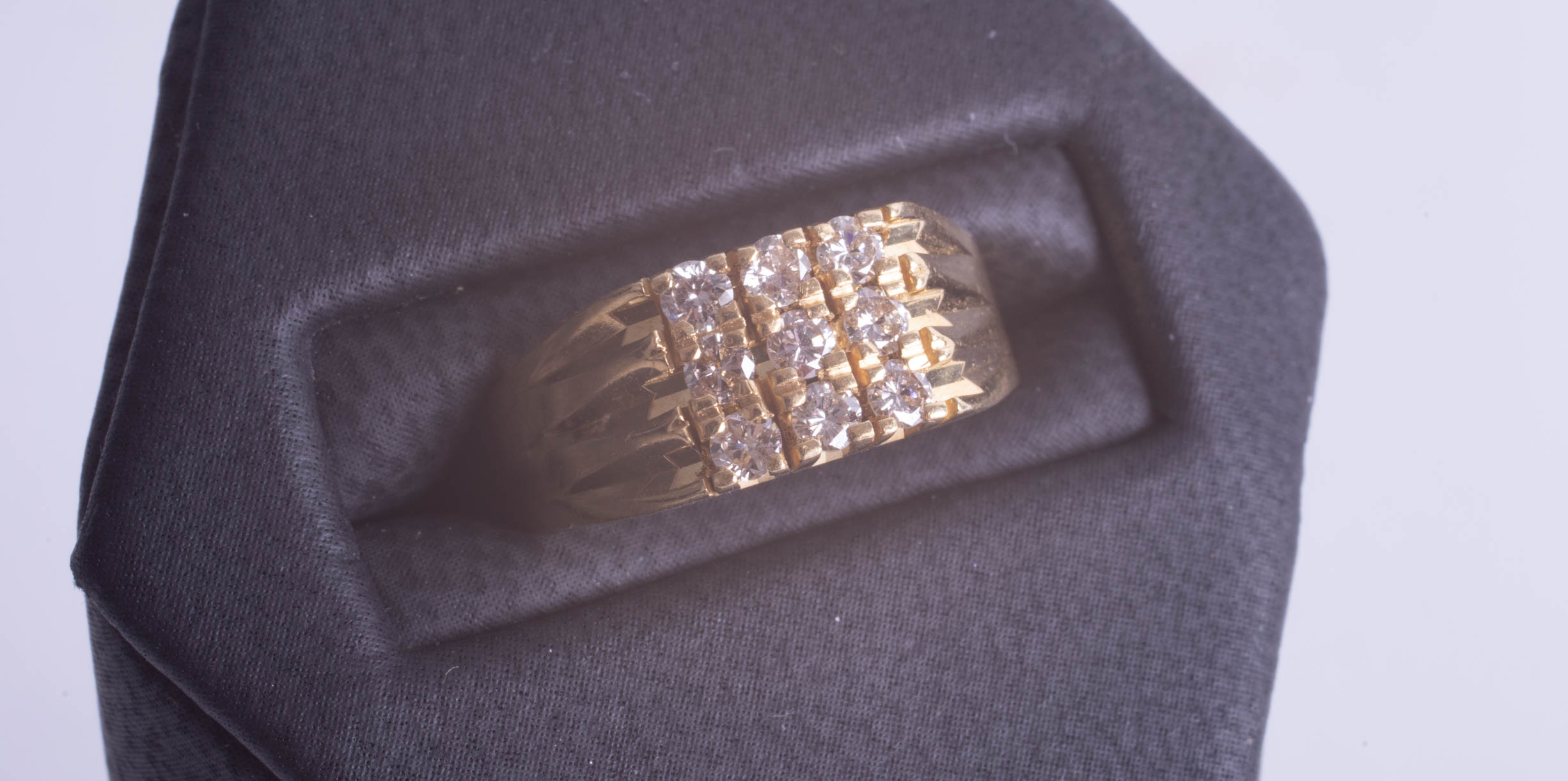 An 18ct nine stone diamond ring, size M. - Image 2 of 2