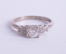 An 18ct Edwardian diamond set ring, size M.