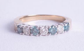 A 9ct blue and white and diamond set ring, size N.