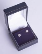 A fine pair of 18ct and diamond set stud earrings approx 1.30ct.