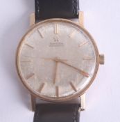 Omega, a 9ct gold gents vintage automatic wristwatch.