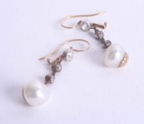 A pair of natural pearl and diamond drop earrings, with Cameo Corner Box.