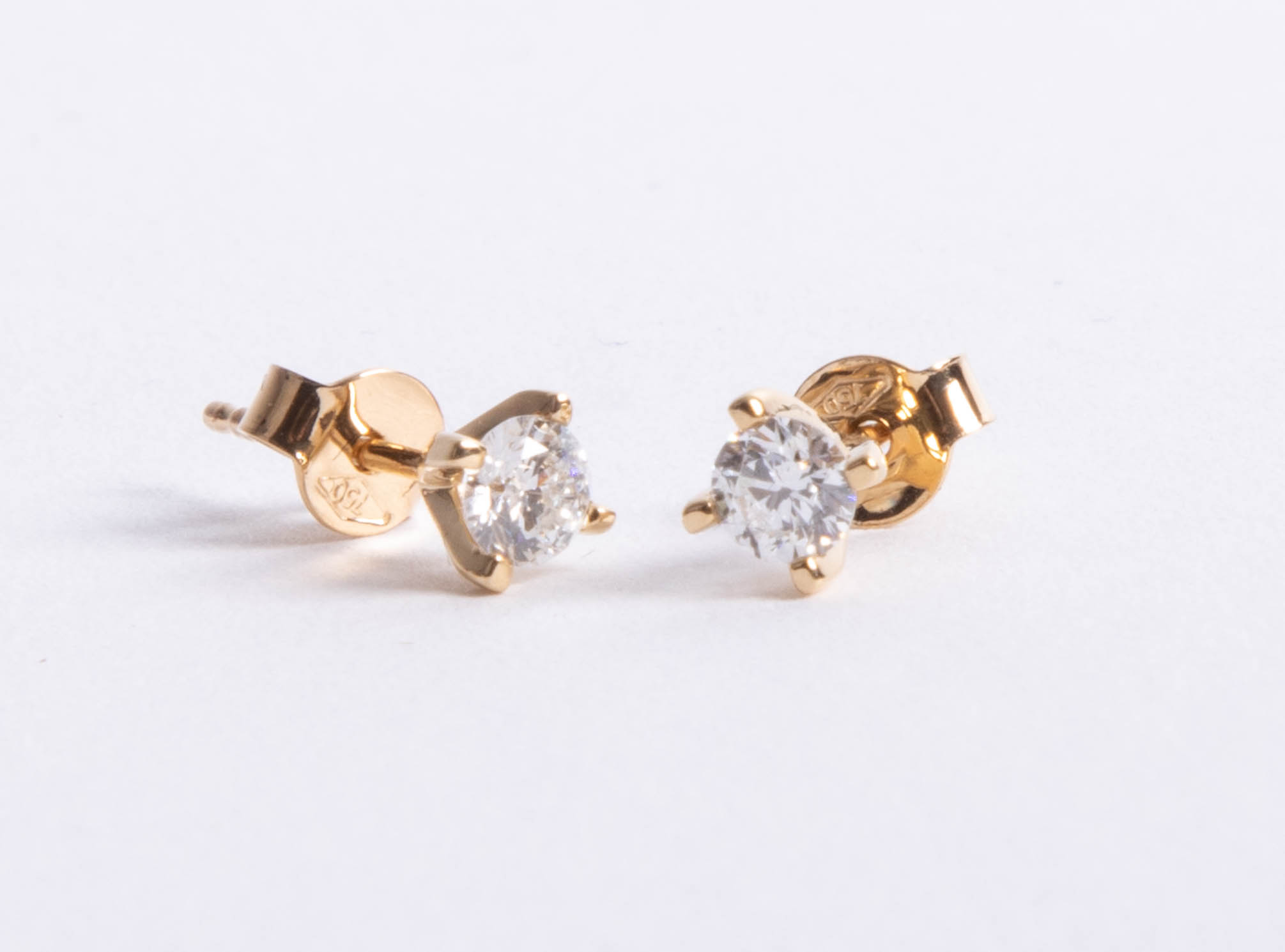 An 18ct gold and diamond stud earrings approx. 0.50ct.