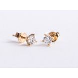 An 18ct gold and diamond stud earrings approx. 0.50ct.