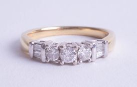 An 18ct diamond seven stone ring, approx. 0.50 ct, size O.