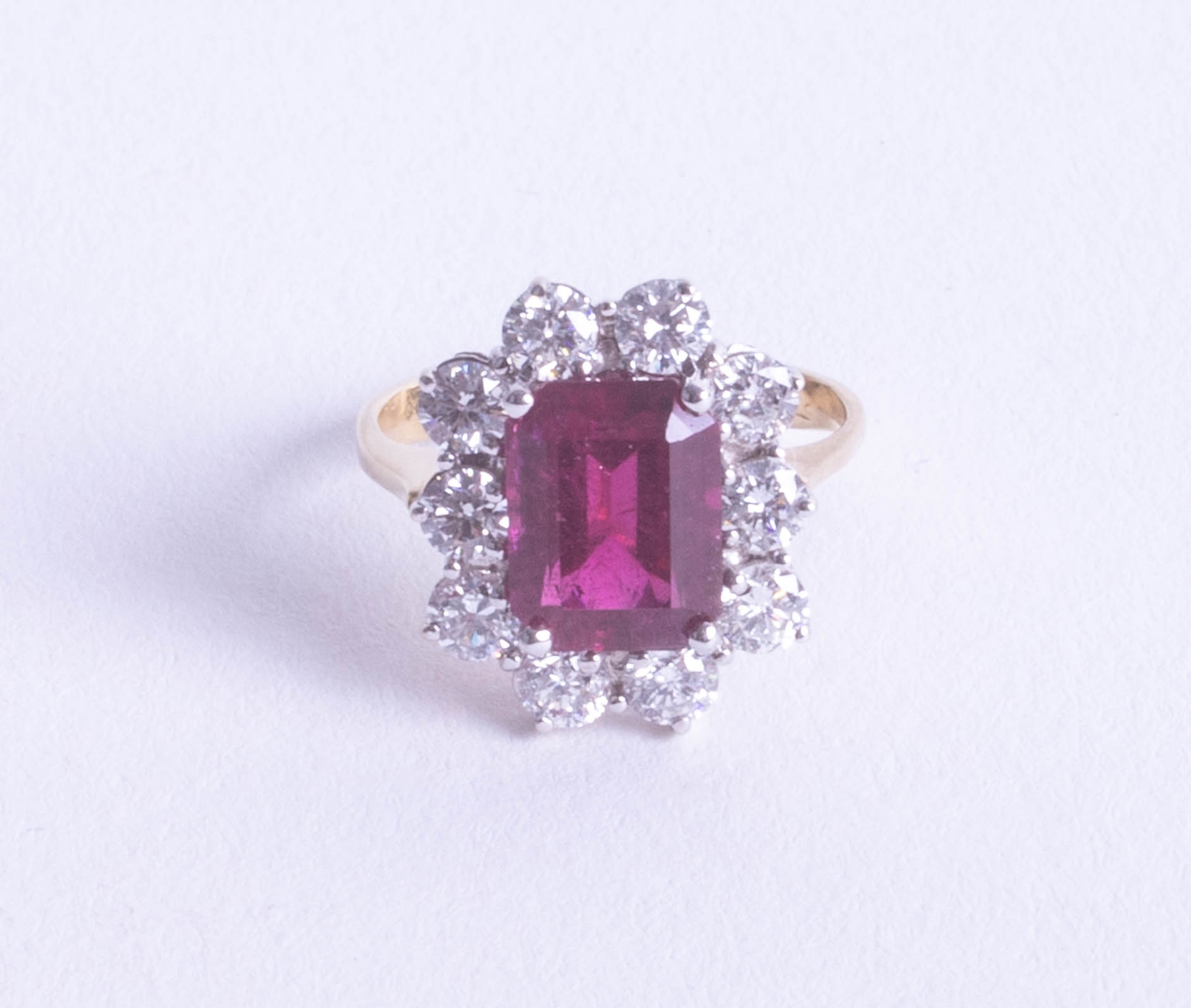 An 18ct diamond and tourmaline ring, size K.