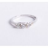 An 18ct white gold and diamond trilogy ring approx. 0.50ct, size M.