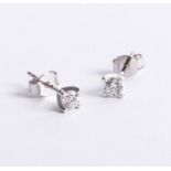 An 18ct white gold and diamond stud earrings approx. 0.50ct.