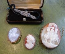 Three cameo brooches including 'Three Graces', height 60mm also a marcadite cocktail watch (4).