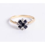 An 18ct sapphire and diamond cluster ring, size Q.