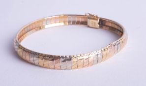 An 18ct multi coloured gold bracelet approx 17.50g.