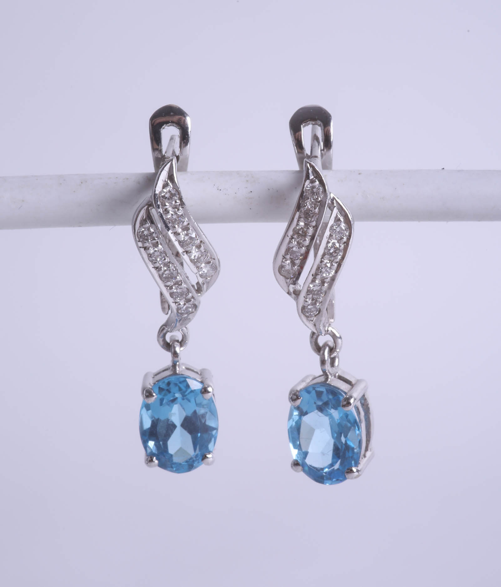 A pair of 18ct diamond and blue topaz earrings. - Image 2 of 2