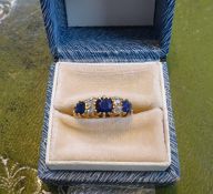 Antique 18ct sapphire and diamond seven stone ring, size K.