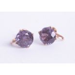 A pair of synthetic Alexandrite earrings set in yellow 18ct gold.
