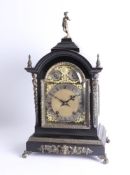 A Victorian ebonised and gilt metal mounted bracket clock with eight day movement striking on a