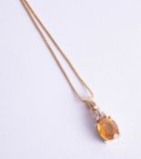 A yellow sapphire and diamond set necklace (purchased new Sri Lanka).