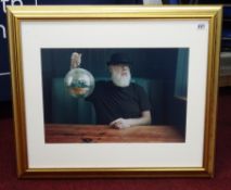 A Man with a disco ball, a photographed portrait by Jojo from his 14th exhibition, Table 32 at the