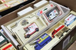 A collection of Lledo 'Days Gone' vehicles, seven sets and seven singles, all mint.