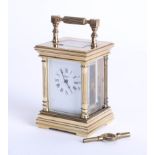 L'Epee a miniature French brass case carriage clock with key.