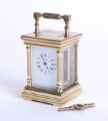 L'Epee a miniature French brass case carriage clock with key.