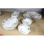 A Victorian part dinner service including 4 tureens, 8 dinner plates ladles and platters.