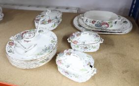 A Victorian part dinner service including 4 tureens, 8 dinner plates ladles and platters.