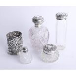 4 various silver top bottles and scent together with a silver ornate bottle holder (5).