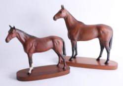 Two Beswick race horses, tallest 31cm, attached to wood plinths (2)