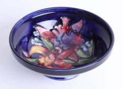 A Moorcroft blue Iris bowl, diameter 17cm signed and stamped.