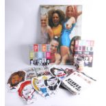 Collection of Spice Girls memorabilia; programs, and poster.