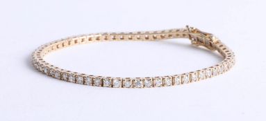 An 18ct yellow gold diamond line bracelet, approx 3.50ct.