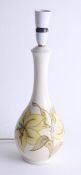 A Moorcroft white lily lamp, height 34cm with fitting, cable & plug.
